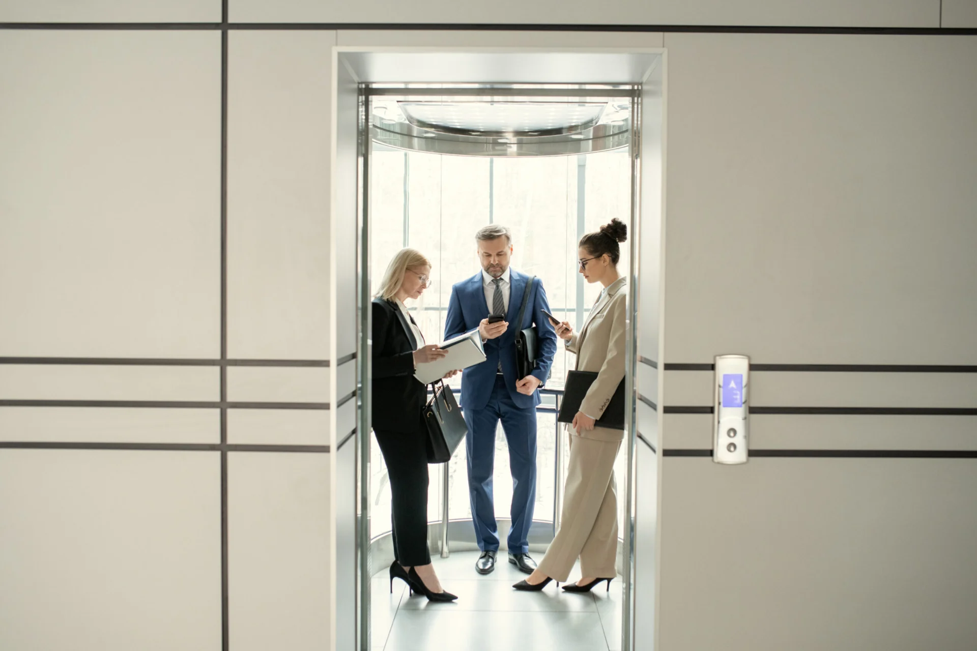 Business People In Elevator