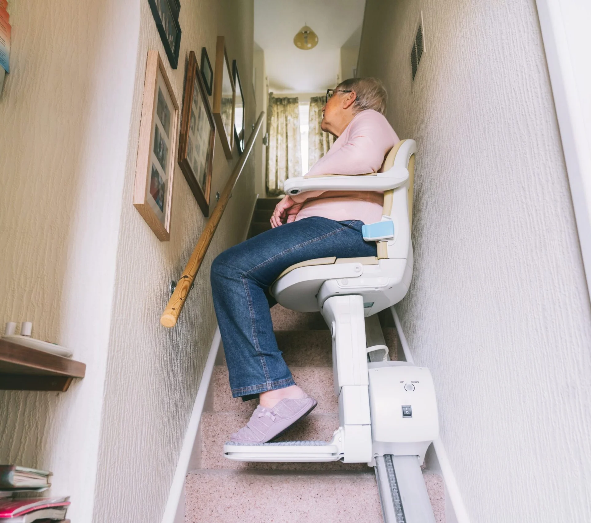 Senior Woman Using Automatic Stairlift On A Stairc 2025 02 14 18 08 12 Utc